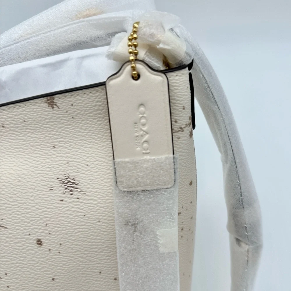 Coach Logan Duffle Bag With Star Print Chalk Cream